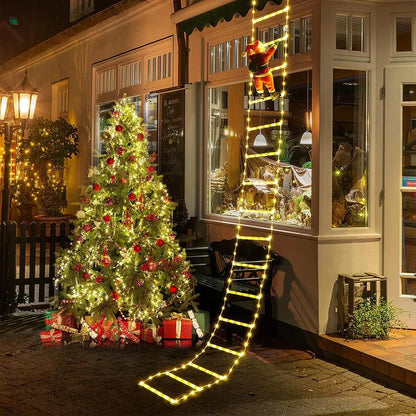 Warm white LED Santa ladder glowing at night.