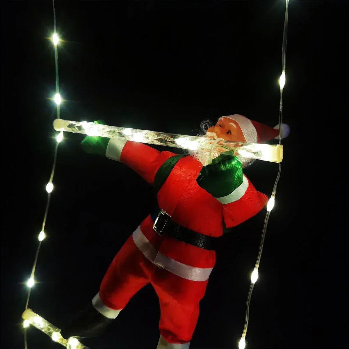 Christmas decoration Santa Claus climbing tree with string lights.